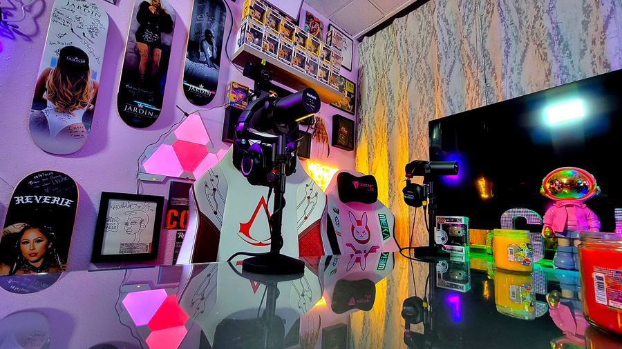 Pink Room table with mics and collectibles