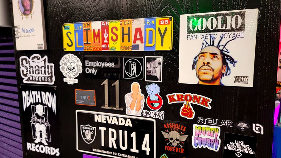 Wall of hip-hop license plates and collectibles