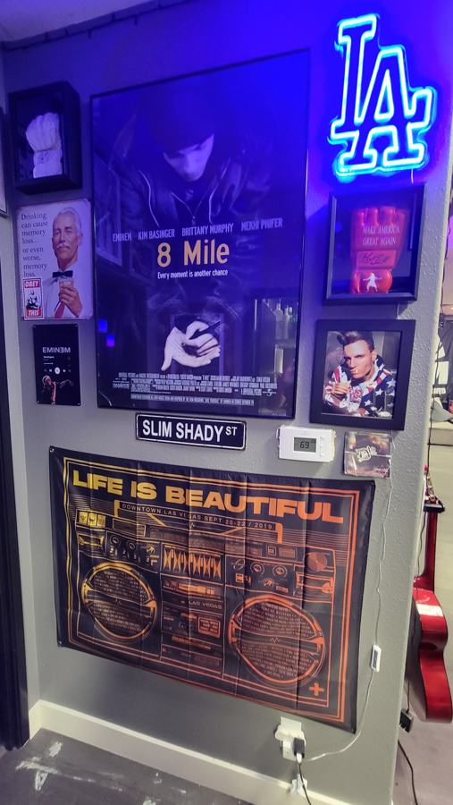 LA neon sign with framed 8 Mile memorabilia