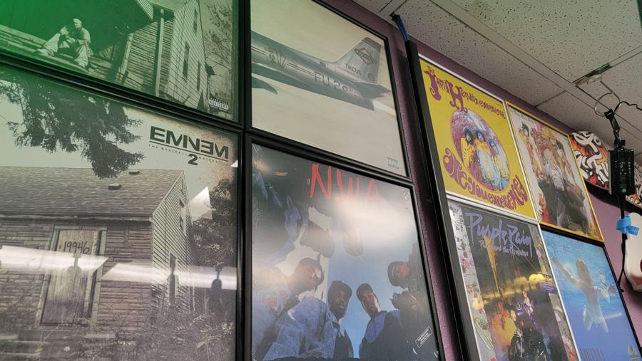 Eminem posters and framed photos in the Green Room