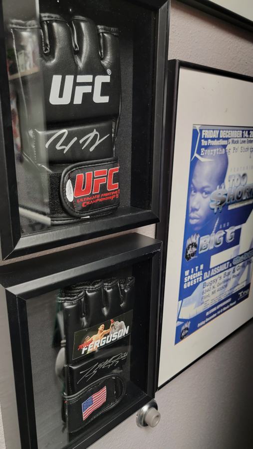 Signed UFC gloves in frames