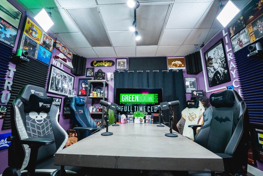 Green Room table set for four with Shure SM7B mics