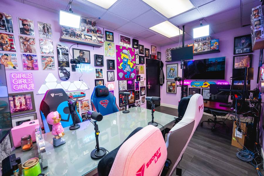 Pink Room glass table with pink and blue gaming chairs