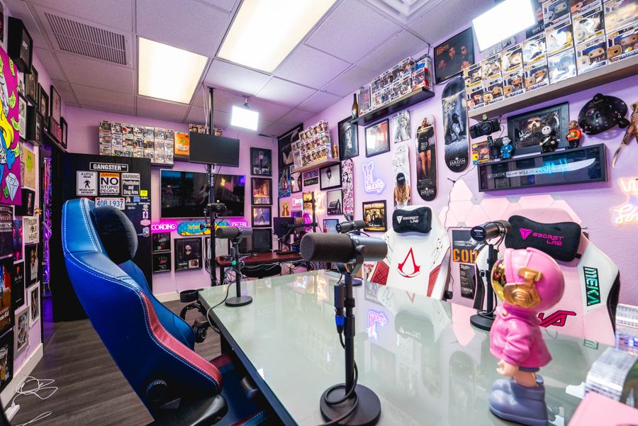 Pink Room from the host seat with neon and pop-culture art