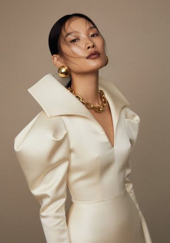 Sound engineer working in music studio with monitors and equaliz